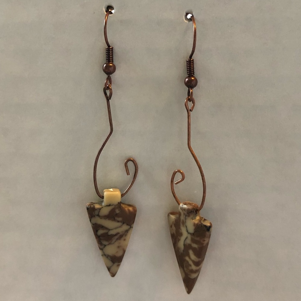 Chocolate copper arrowhead earrings.